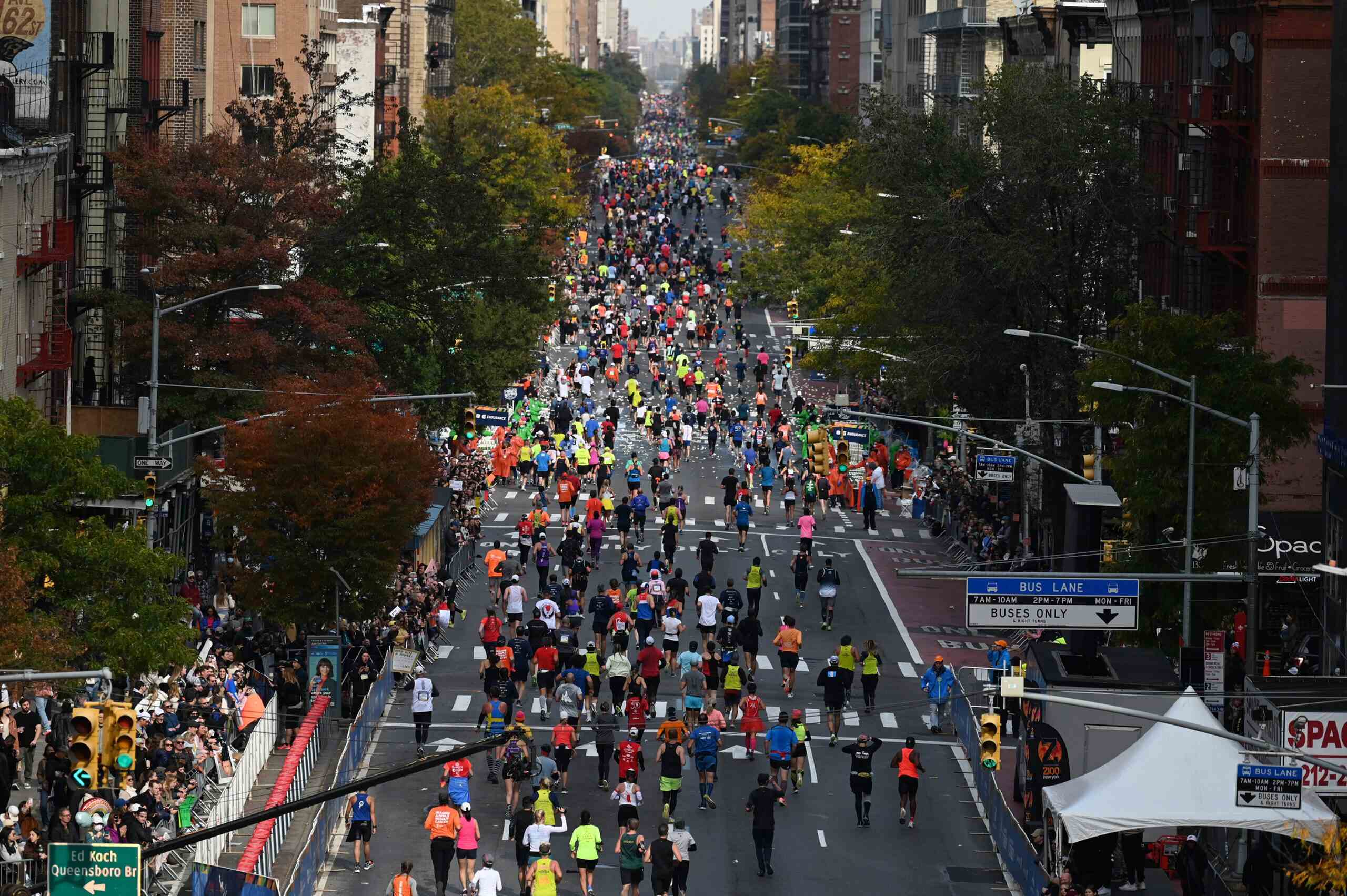 NEW YORK, NY – NOVEMBER 7: The 2021 TCS New York City Marathon is held on November 7, 2021. The course goes through all five boroughs of New York City, starting in Staten Island and ending in Central Park.  This year marks the 50th running of the marathon. The scene on the Queensboro Bridge and 1st Avenue.  (Photo by Jon Simon for NYRR)